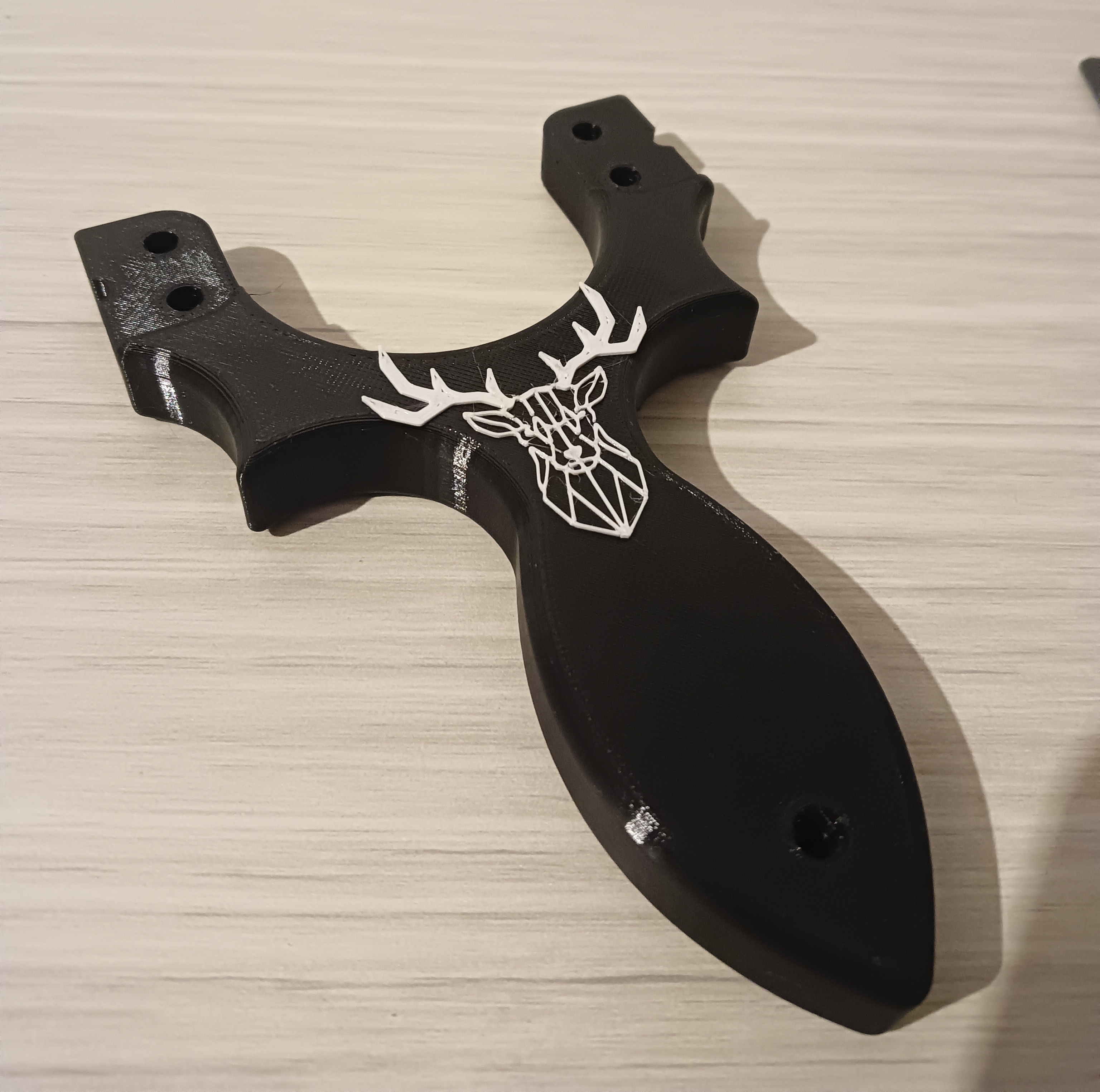 Ná Săn Chuột ("Hunting Slingshot")