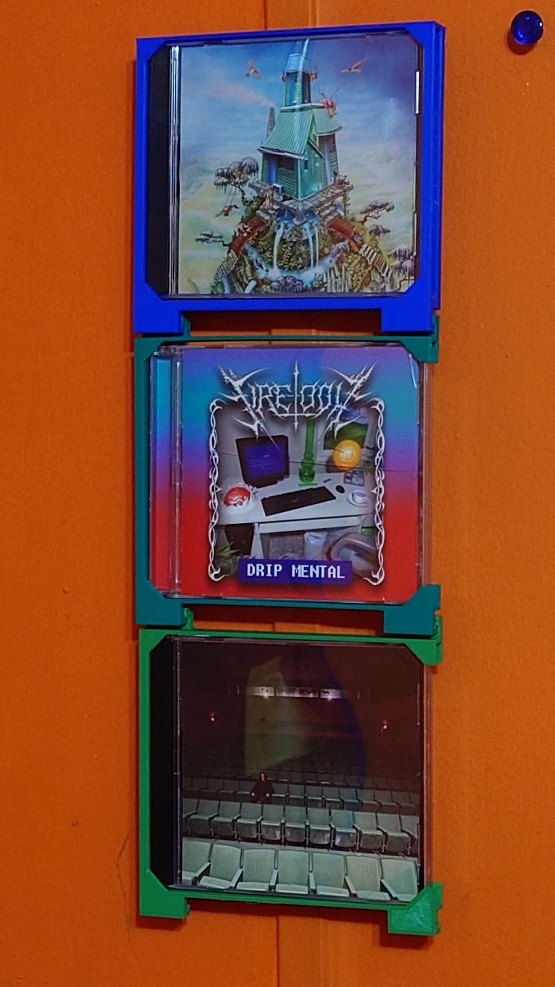 Người giữ vỏ trang sức CD gắn trên tường