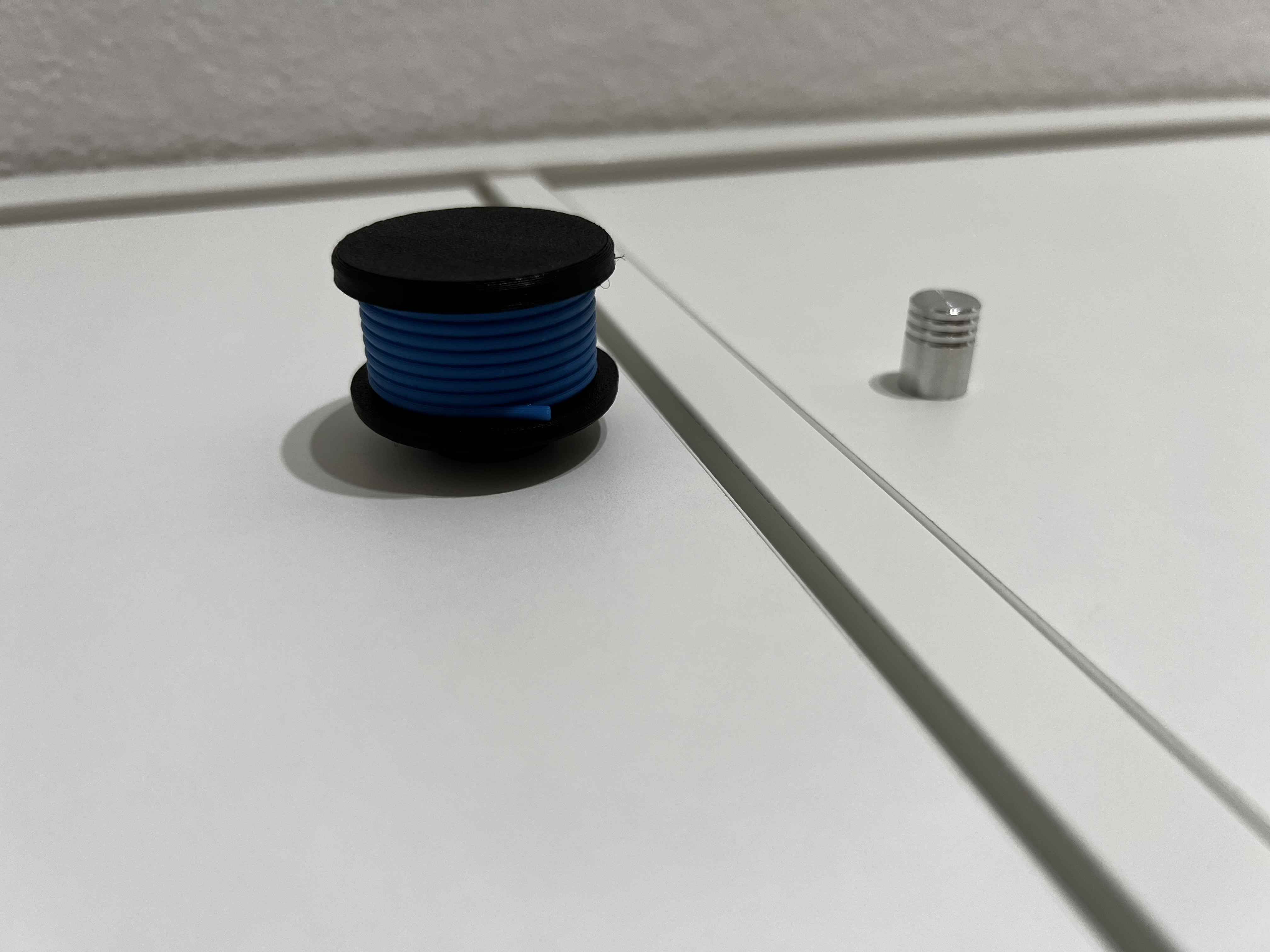 Nút Cuộn Dây Filament Kallax Dẹp Hơn