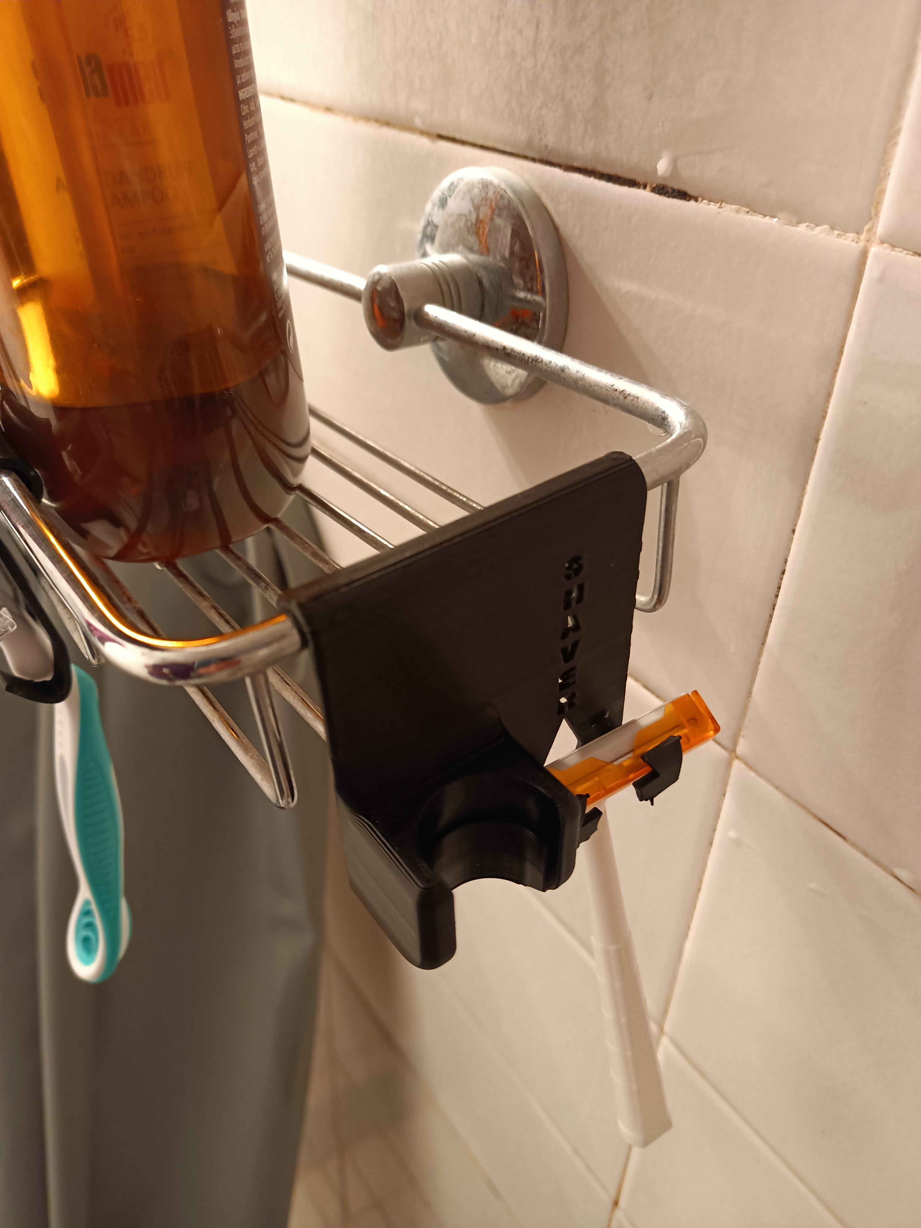 Máy cạo râu và người giữ vòi hoa sen