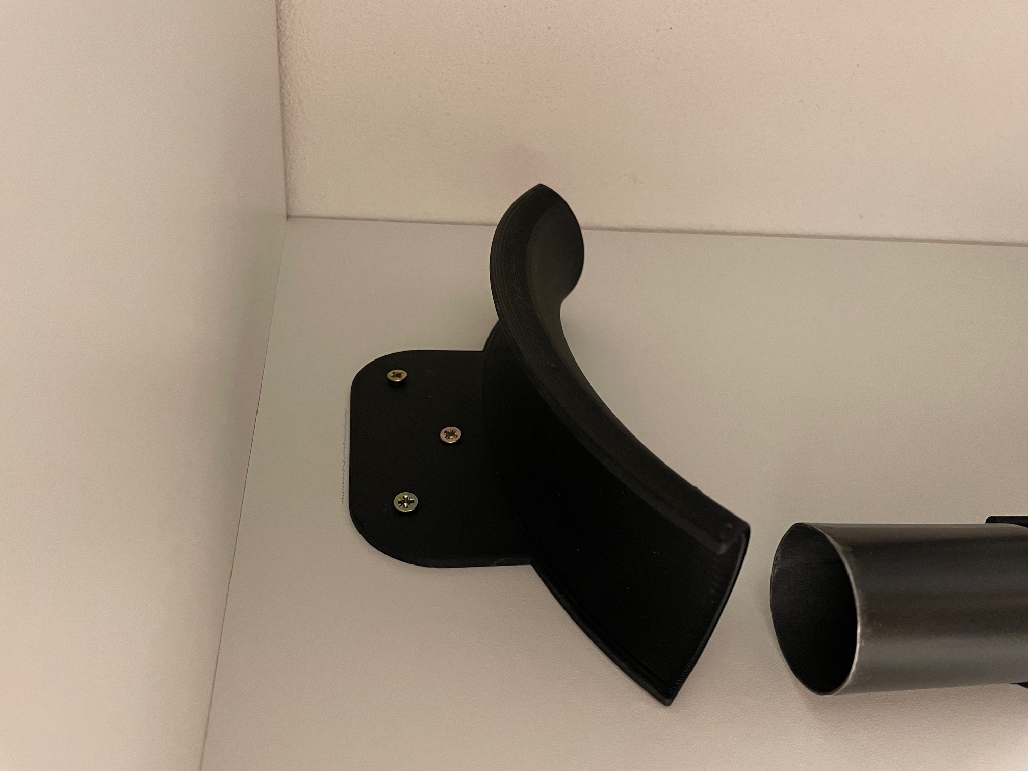 Người giữ vòi cho máy hút bụi