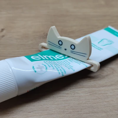 Dụng Cụ Bóp Tuýp Kem Đánh Răng Hình Con Mèo