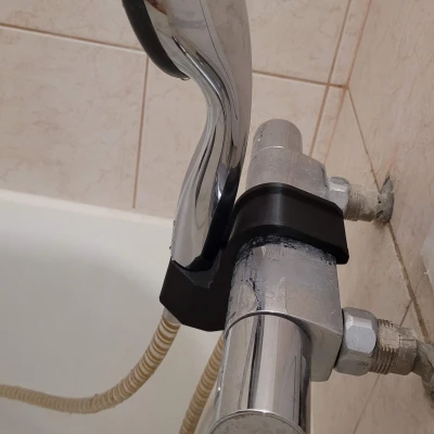 Giá đỡ đầu sen gắn trên vòi sen cây nóng lạnh