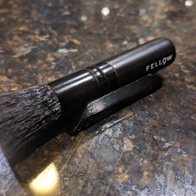 Người giữ bàn chải máy xay cà phê ode đồng nghiệp