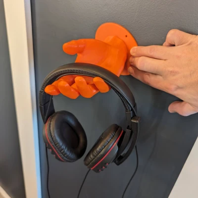 Bàn tay tai nghe có thể gắn trên tường