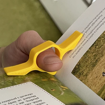 Người trợ giúp đọc sách một tay