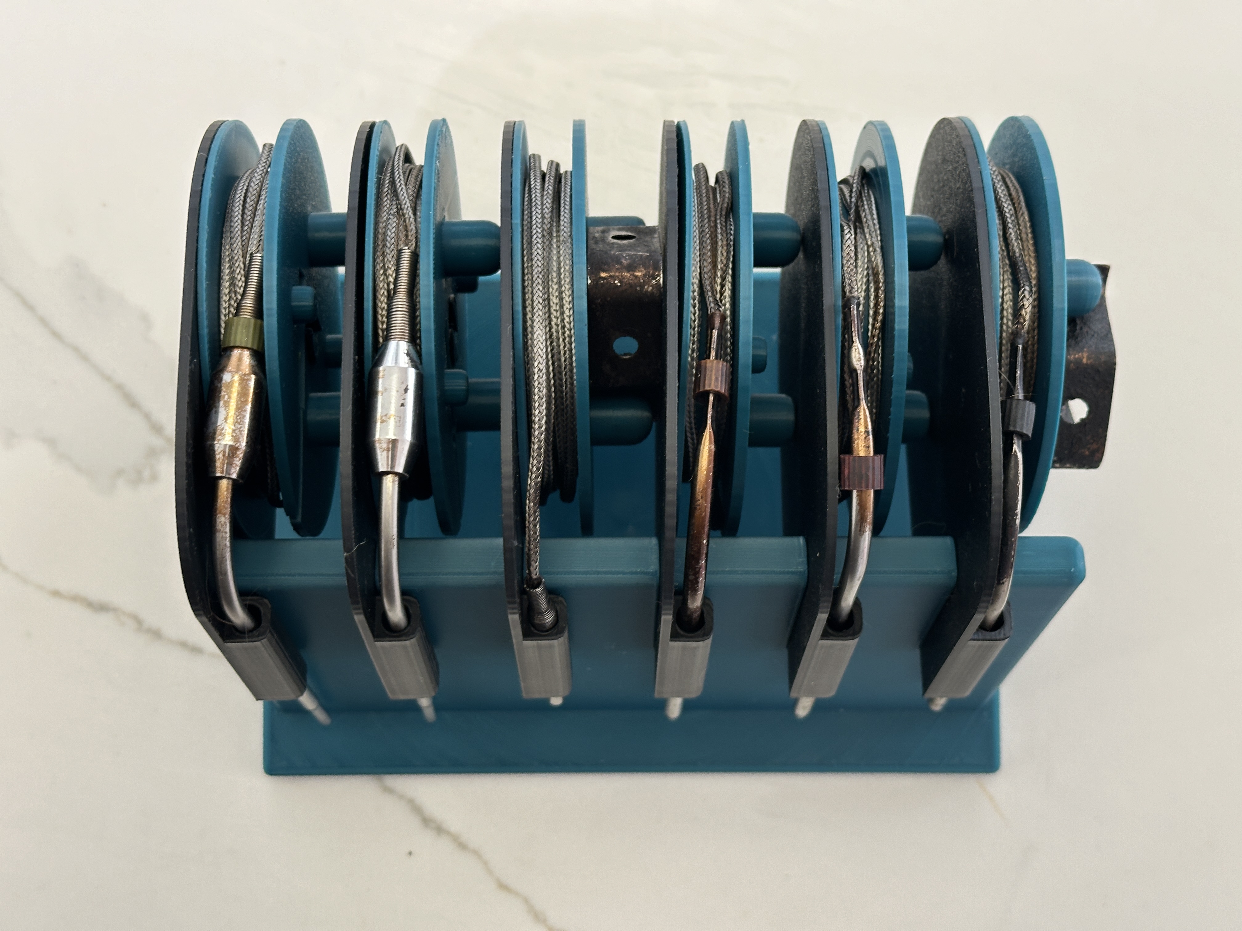 Kệ đựng cuộn dây dò nhiệt BBQ xoay