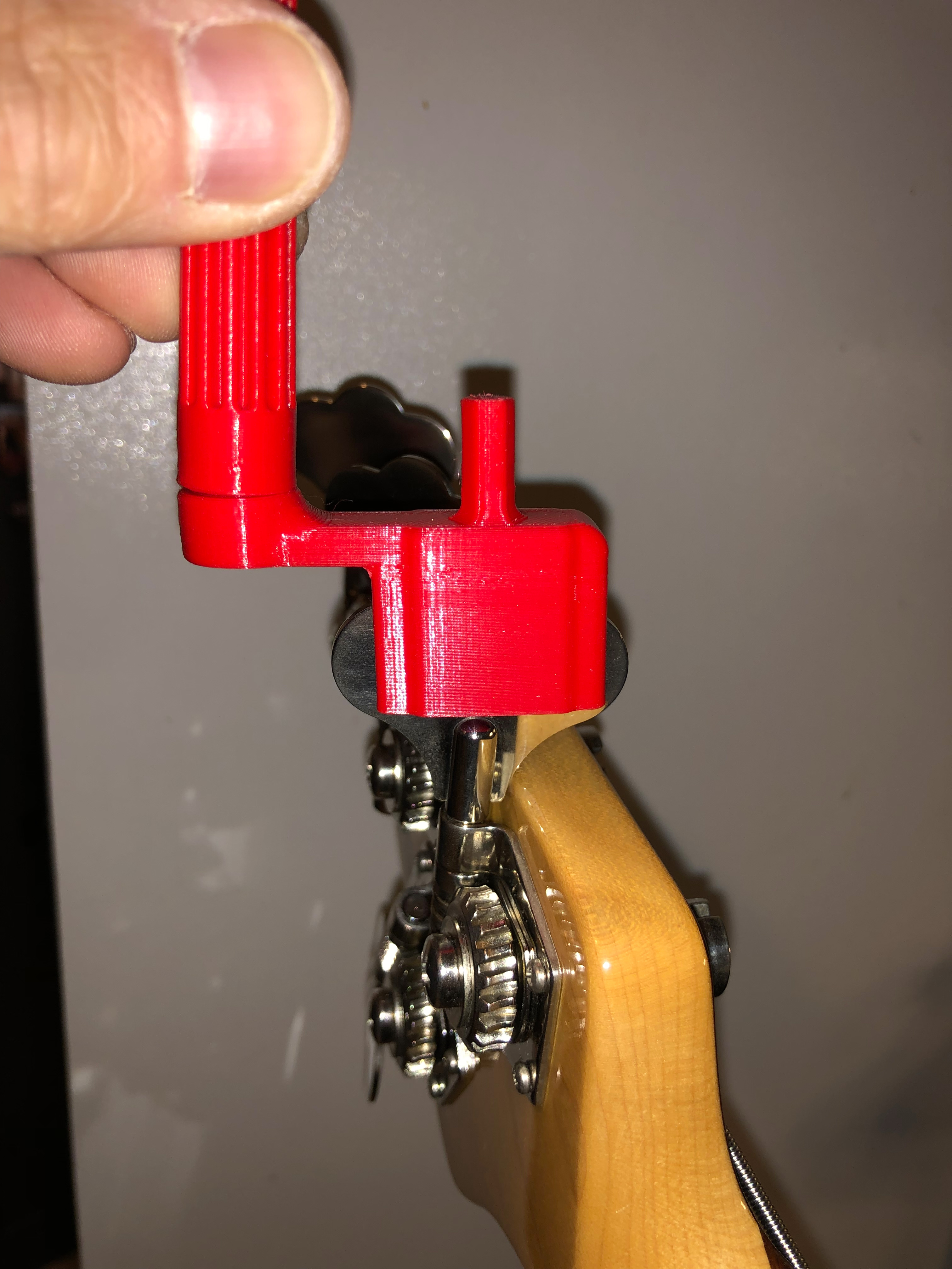 Dụng cụ lên dây đàn Bass/Guitar