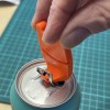 Dụng cụ mở khoen lon nước giải khát và nắp đậy - Thumbnail 1
