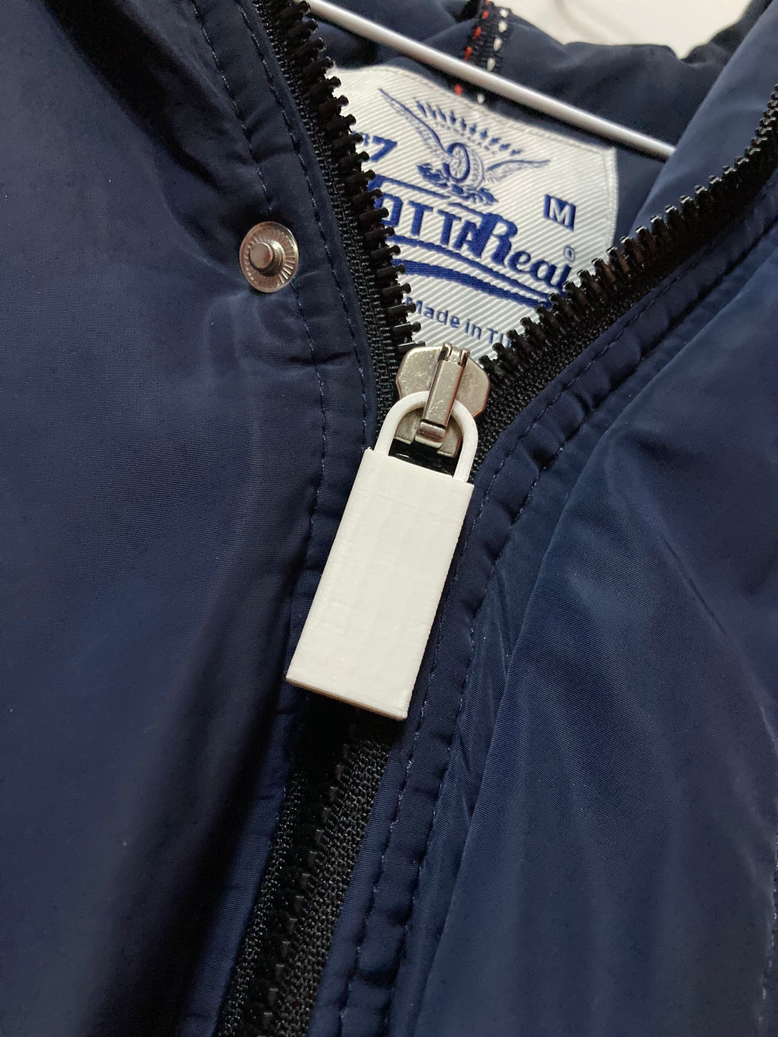 Tay cầm khóa kéo "Zipper grip"