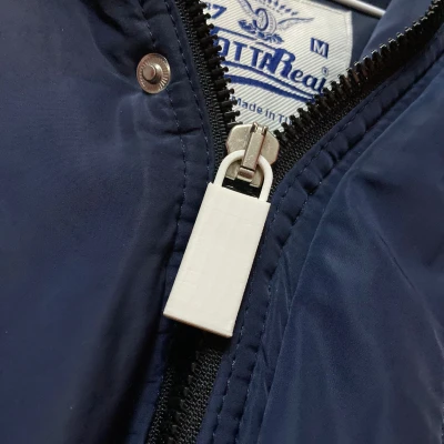 Tay cầm khóa kéo "Zipper grip"