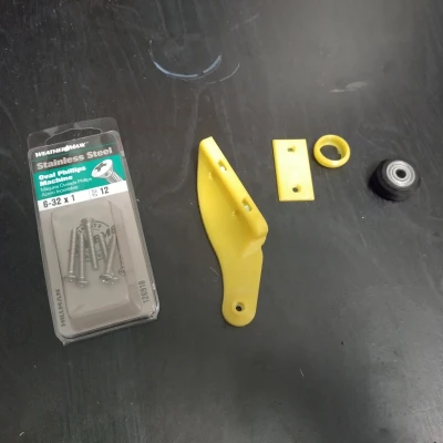 Ngàm đỡ hộc tủ con lăn đơn