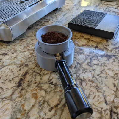 Giá Đỡ Nén Portafilter Đáy Rỗng Breville 58mm