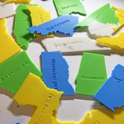 Tên Tiểu Bang Để Dập Nổi Mặt Sau Các Mảnh Ghép Bản Đồ Hoa Kỳ