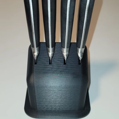 Dụng cụ Giữ Dao Bít Tết