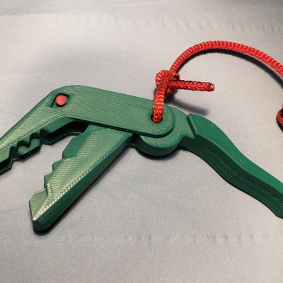 Kẹp Khủng Long Có Lỗ Treo Dây