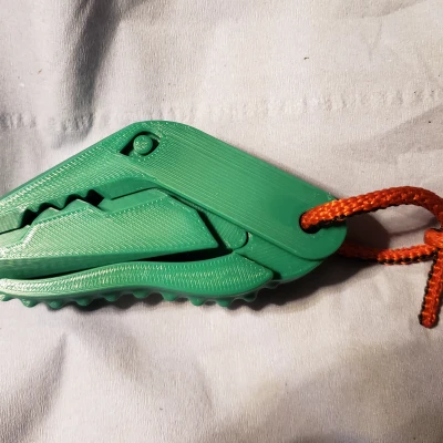 Kẹp Khủng Long Có Lỗ Treo Dây