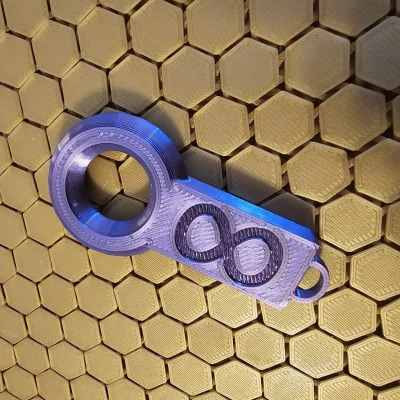 Móc khóa tròn có hoa văn