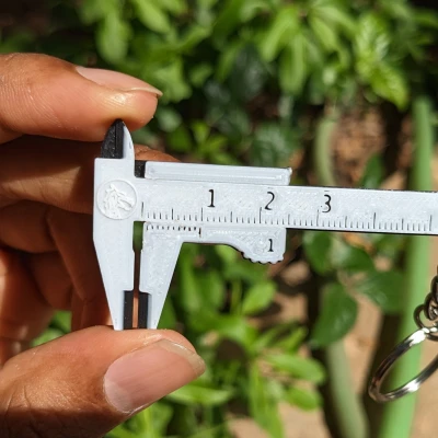 Móc Khóa Thước Cặp Mini