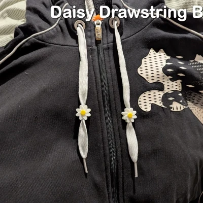 Hạt Chặn Dây Rút Hình Hoa Cúc