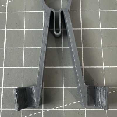 Nhíp giữ que đo multimeter