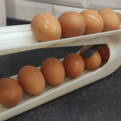 Dụng cụ đựng trứng xoay + làm chậm