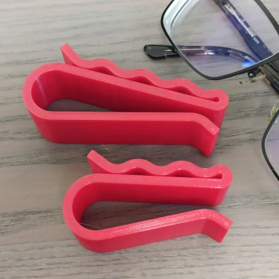 Kẹp giữ kính mắt cho tấm che nắng xe hơi