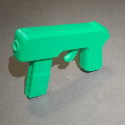 Tiny Toy Blaster V2 (Súng Đồ Chơi Airsoft 6mm) Không Keo, Không Ốc Vít: Chỉ Dây Thun và Bản In