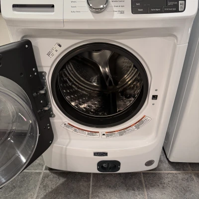 Nắp che lỗ truy cập bơm máy giặt cửa trước