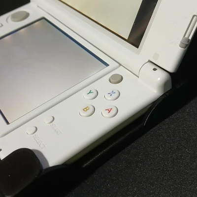 Dụng cụ giữ nút nhấn cho New 3DS XL