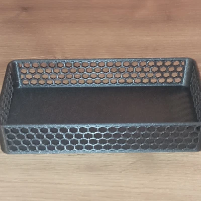 Hộp với các lỗ lục giác