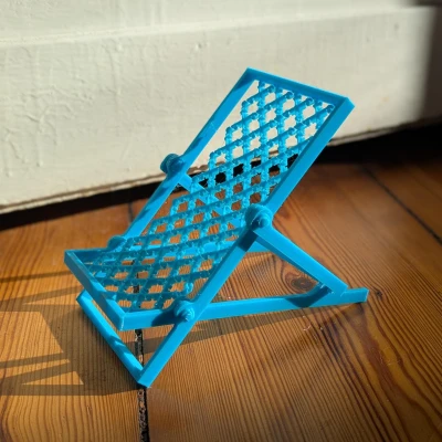 Giá đỡ điện thoại hình ghế xếp bãi biển