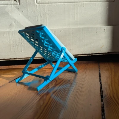 Giá đỡ điện thoại hình ghế xếp bãi biển