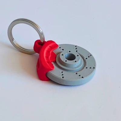 Móc khóa đĩa thắng xoay được