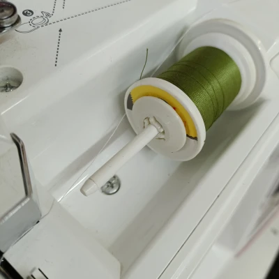 Móc Giữ Chỉ Máy May Brother