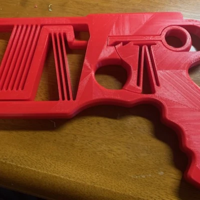 Súng Đĩa Cơ Cấu Đàn Hồi