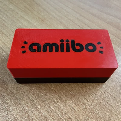 Hộp đựng xu Amiibo + Xu đi kèm