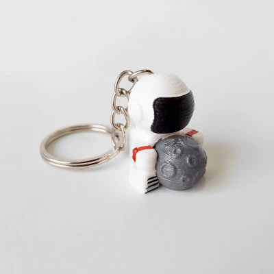 Móc Khóa Phi Hành Gia Ôm Trăng