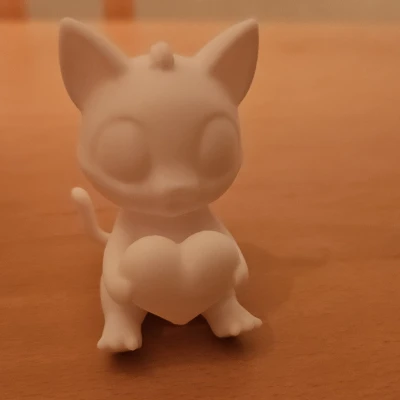 Mèo Valentine ôm trái tim