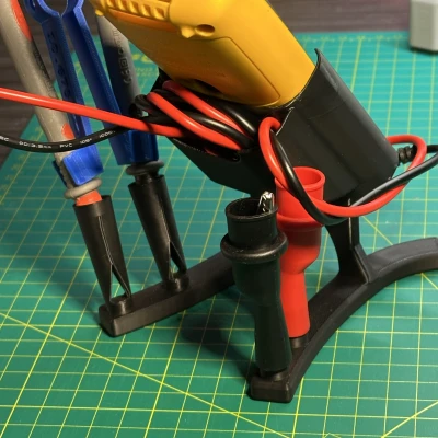 Kệ để đồng hồ Fluke 101 (bản cập nhật) có ngàm giữ que đo