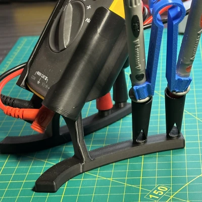 Kệ để đồng hồ Fluke 101 (bản cập nhật) có ngàm giữ que đo