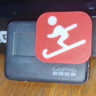 Nắp Che Ống Kính GoPro Hero 7 Với Logo Người Trượt Tuyết