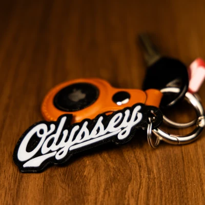 Móc khóa logo Odyssey - chữ viết tay (Cursive Style)