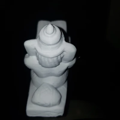 Ganesha Reading (Ganesha ngồi đọc sách trên đá)