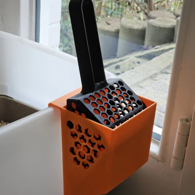 Muỗng xúc cát vệ sinh cho mèo có đế