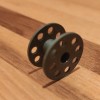 Ống suốt/ống chỉ máy may (sewing machine bobbin spool) - Thumbnail 1