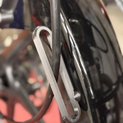 Giá giữ dây đồng hồ tốc độ Yamaha YBR 125 (TPU/PLA)