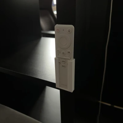 Giá treo tường giữ remote Samsung Freestyle