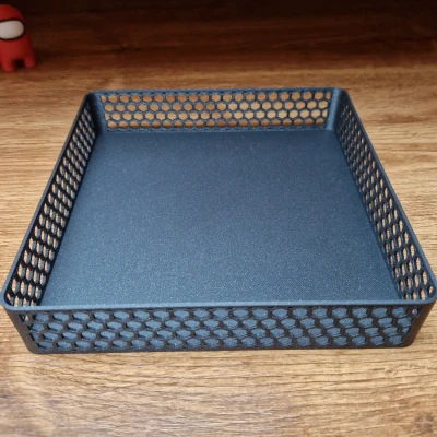 Hộp với các lỗ lục giác